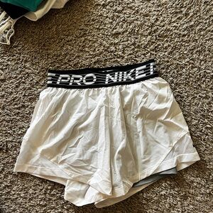 Nike Women's White Athletic Shorts with Black Waistband